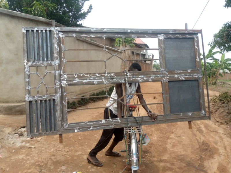 delivering a window on a bike